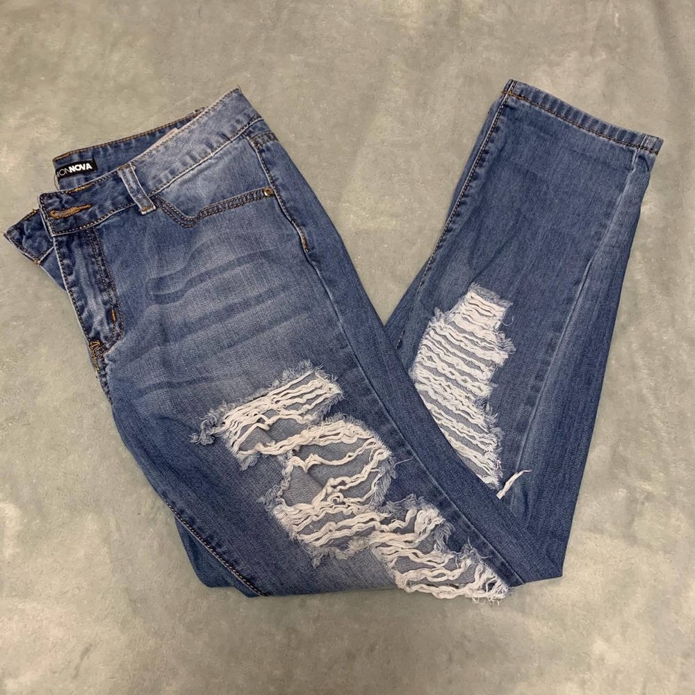 LIKE NEW size 3 ripped jeans